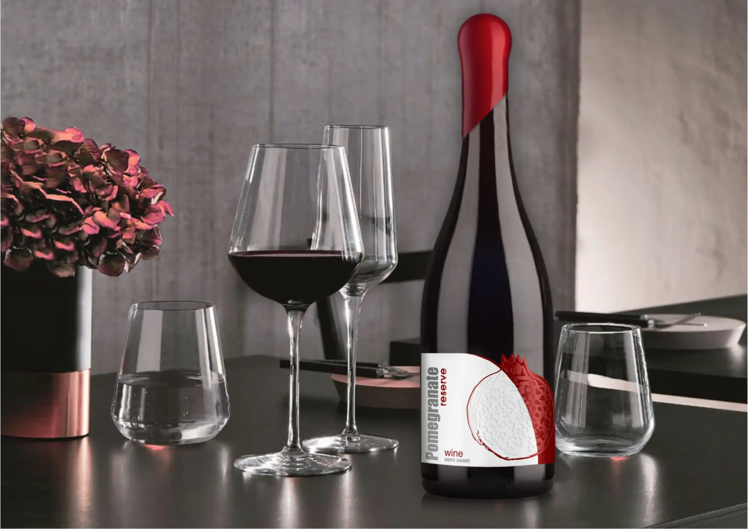 Front label design of MAP’s Pomegranate Reserve wine bottle